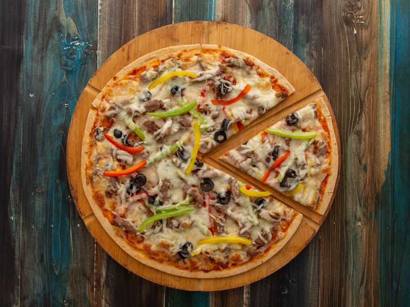 Thick-crust pepperoni jets pizza fresh from the oven